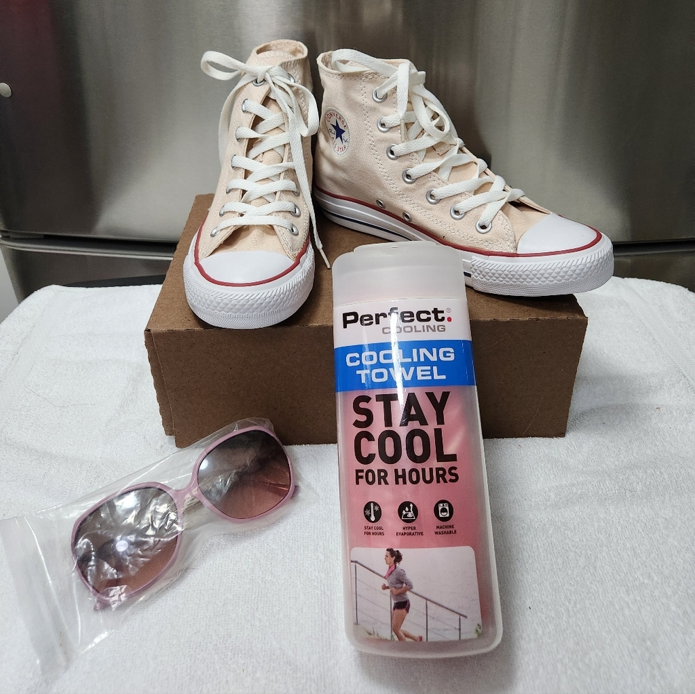 Women's CONVERSE Chuck 70 High Top Sneakers.